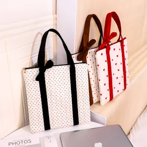 Set of three quilted heart and polka dot tote bags for women's daily commuting laptop storage