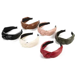 Set of six stylish knotted PU leather wide headbands in assorted classic colors