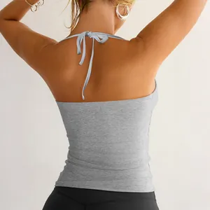 Back view of grey ribbed halter neck top with sexy tie-back detail and slim fit.