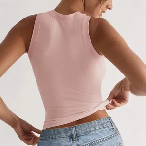 Back view of a trendy pink ribbed knit tank top for women in casual Y2K street fashion
