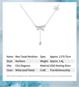 Detail view of S925 sterling silver bowknot necklace with zircon tassel pendant