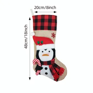 Christmas stocking with 3D penguin character and size labels, 18 inch long.