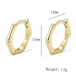 Close-up of 925 sterling silver gold-plated bamboo joint hoop earrings with measurements