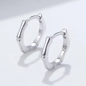 Elegant 925 sterling silver bamboo-joint hoop earrings with a chic minimalist design.