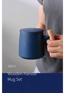 Detailed view of the 360ml matte blue ceramic mug with ergonomic wooden handle