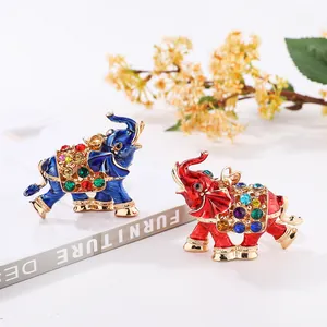 Detailed view of colorful 3D elephant keychains with sparkling rhinestones