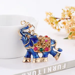 Detailed view of a colorful blue enamel elephant keychain with sparkling crystal gems