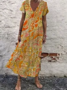 Vibrant boho V-neck short sleeve maxi dress with orange paisley print for summer vacation