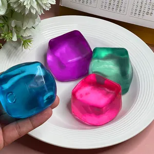 Close-up view of vibrant translucent ice cube squishy toys designed for stress relief