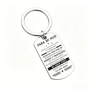 Detailed view of a silver stainless steel keychain engraved with Spanish text for a son