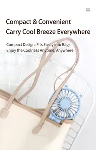 Portable light blue mini fan shown stored inside a stylish beige canvas bag detail