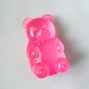 Juguete antiestrés de osito de goma rosa con textura translúcida