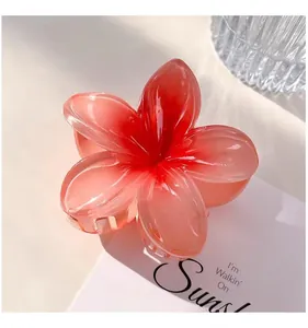 Elegant frangipani flower hair claw clip in gradient red, beach style accessory