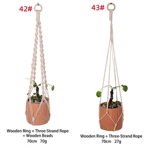 Handwoven cotton plant hangers with wooden rings and beads in two styles.