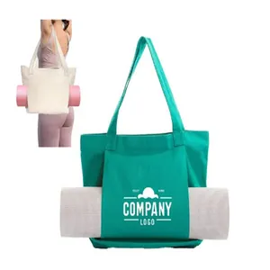 Green canvas yoga mat carrier tote bag with functional mat sleeve detail