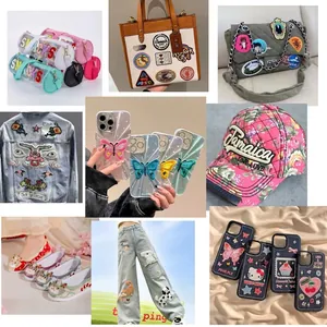 Close-up of colorful cartoon and letter embroidered patches on various lifestyle accessories