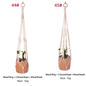 Two styles of hand-woven macrame plant hangers with wooden rings and beads