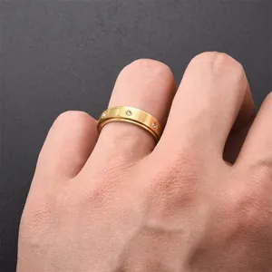 Golden stainless steel rotatable ring with six inset stones for women fashion jewelry