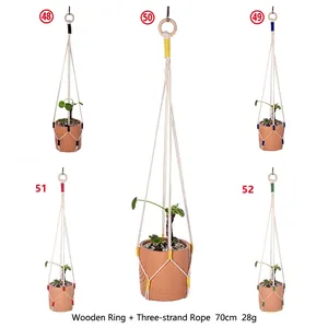 Handmade macrame plant hangers with wooden rings shown in five different color options