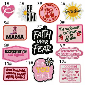 Detailed collection of twelve pink cartoon motivational English embroidered patches