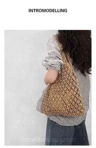 Detailed view of the intricate handmade cotton rope weaving on a bohemian hollow bag