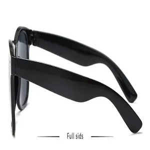 Side view of classic black retro sunglasses with rivet details.