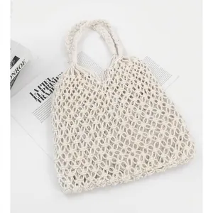 Stylish handmade white cotton rope woven hollow-out shoulder bag for women's vacation