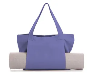 Purple canvas yoga mat tote bag for carrying exercise mats in fitness and Pilates.