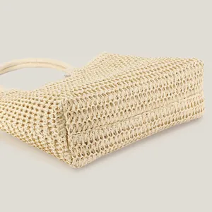Stylish handwoven straw tote bag with large capacity in cream white for daily commute