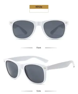 Close-up detail of white retro classic sunglasses with grey lenses and metallic rivets.