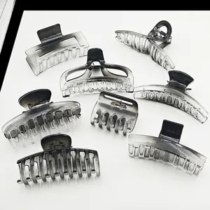 Variety of smokey grey translucent hair claw clips in different geometric shapes