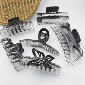 Collection of grey gradient transparent hair claw clips in various elegant shapes