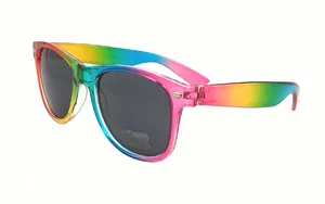 Detail view of rainbow gradient sunglasses with dark lenses and transparent frame