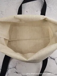 Interior detail of the natural beige canvas shopping bag showing spacious capacity