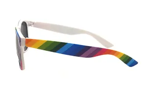 Detail view of white sunglasses featuring a vibrant rainbow striped temple design.