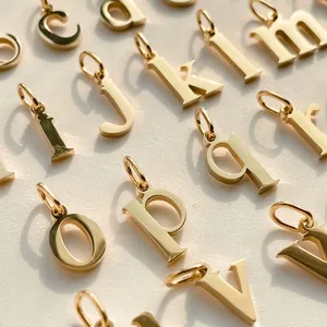 Minimalist set of 26 gold stainless steel alphabet letter pendants for jewelry making