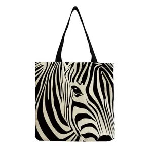 Detailed macro view of the striking black and white zebra print on a large shopping bag