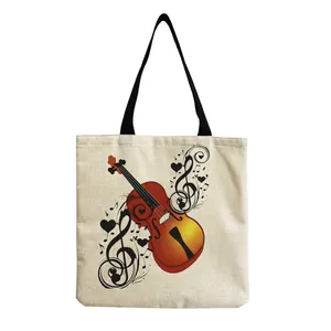 Close-up of canvas shopping bag with artistic violin and musical note print detail