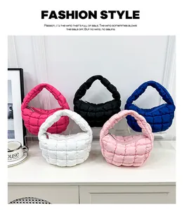 Selection of stylish quilted cloud handbags in pink, black, blue, and white colors
