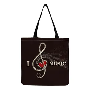 Black foldable tote bag featuring musical notes and red heart print design for music lovers
