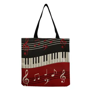 Casual tote bag featuring piano keys and musical notes print on red and black canvas