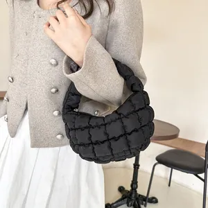 Elegant black quilted cloud bag with pleated puffer texture in Korean minimalist style