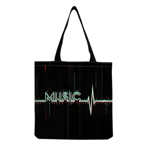 Close-up of Harajuku style music print on a black foldable canvas shopping bag