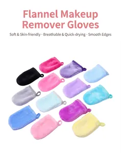 Macro view of various colorful soft flannel makeup remover gloves for facial cleansing.