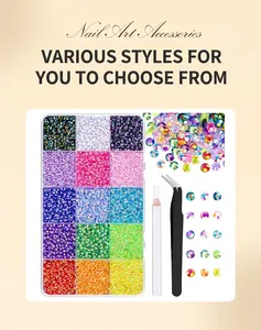 Detail view of 15-grid multicolored resin nail art rhinestones with tools