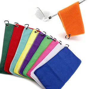 Microfiber golf towels with waffle pattern and carabiners available in vibrant colors