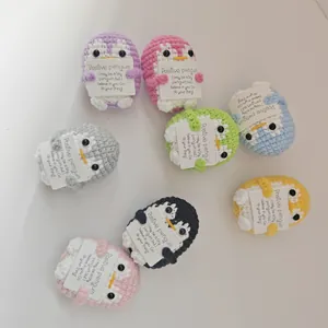 Assorted handmade crochet positive penguin dolls with encouraging quote cards for gifts
