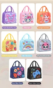 Variety of insulated lunch bags with 3D cartoon designs for students and adults