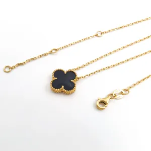 18K gold plated chain necklace with black four-leaf clover pendant and lobster clasp