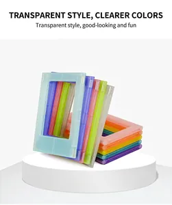 Detail view of colorful 3-inch magnetic transparent Instax photo frames stacked on a pedestal